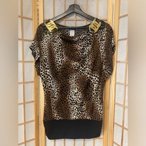 Leopard print blouse with gold embellishment.